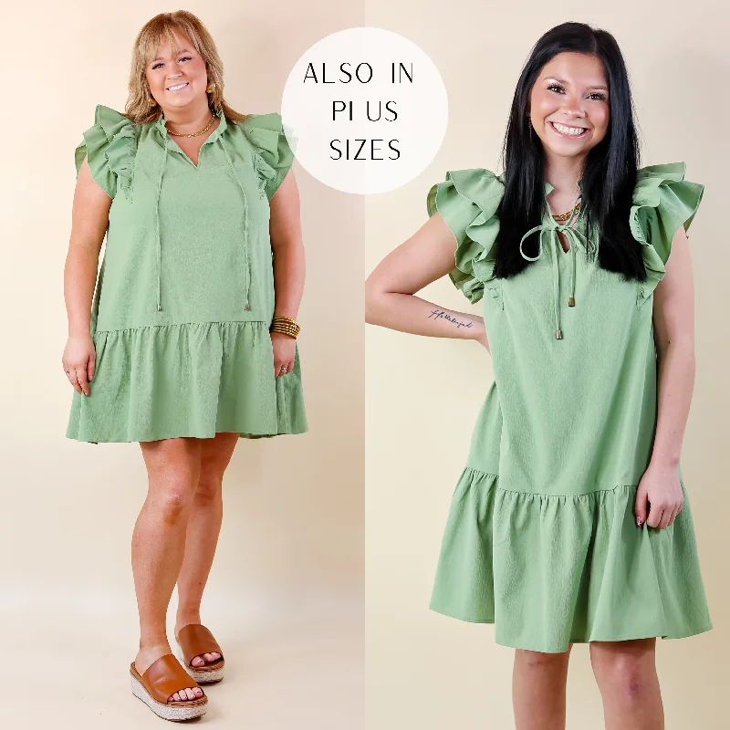 Trendy Boutiques Online Powerful Love Ruffle Cap Sleeve Dress with Keyhole and Tie Neckline in Sage Green Trendy Boutiques Online Powerful Love Ruffle Cap Sleeve Dress with Keyhole and Tie Neckline in Sage Green
